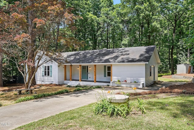 3916 W Allen, Raleigh, NC 27603 - view of front of property featuring covered porch, crawl space, and roof with shingles