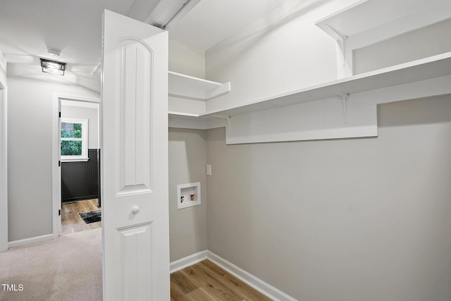 3916 W Allen, Raleigh, NC 27603 - laundry area with hookup for a washing machine, baseboards, and wood finished floors