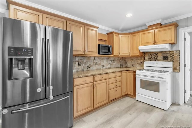 5409 S Sumac Cir, Fayetteville, NC 28304 - kitchen with stainless steel appliances, under cabinet range hood, light wood-type flooring, light stone countertops, and ornamental molding