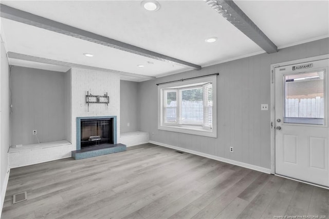 5409 S Sumac Cir, Fayetteville, NC 28304 - unfurnished living room featuring beam ceiling, wood finished floors, a fireplace, baseboards, and recessed lighting