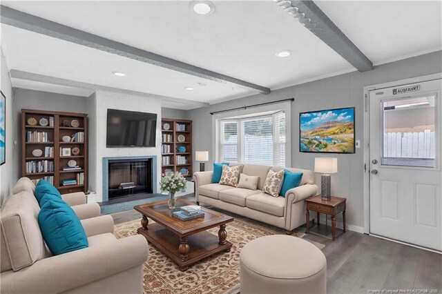 5409 S Sumac Cir, Fayetteville, NC 28304 - living room featuring beam ceiling, wood finished floors, a large fireplace, baseboards, and recessed lighting