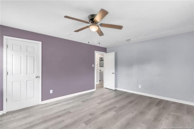 5409 S Sumac Cir, Fayetteville, NC 28304 - unfurnished bedroom with wood finished floors, baseboards, and ceiling fan