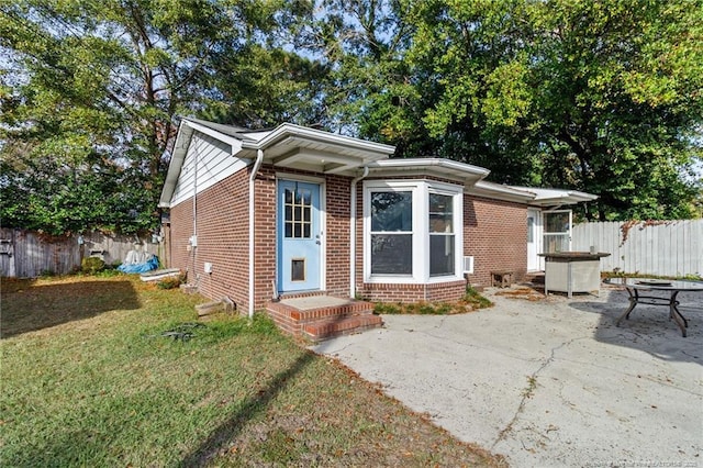 5409 S Sumac Cir, Fayetteville, NC 28304 - view of front of property with brick siding and a patio