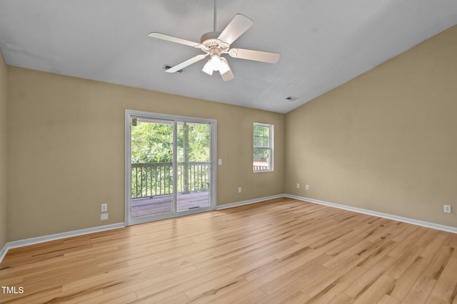 5134 Greenville Loop Rd Apt D, Wilmington, NC 28409 - unfurnished room with light wood finished floors, baseboards, vaulted ceiling, and ceiling fan