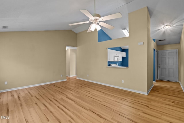 5134 Greenville Loop Rd Apt D, Wilmington, NC 28409 - spare room featuring a ceiling fan, light wood-style floors, baseboards, and lofted ceiling