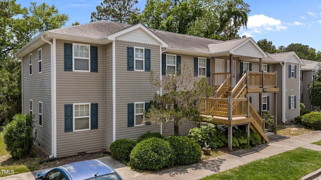 5134 Greenville Loop Rd Apt D, Wilmington, NC 28409 - view of front facade with roof with shingles and stairs