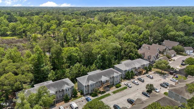 5134 Greenville Loop Rd Apt D, Wilmington, NC 28409 - aerial view of residential area featuring a heavily wooded area