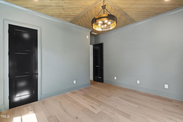 2805 Van Dyke Ave, Raleigh, NC 27607 - empty room with wood ceiling, wood finished floors, a chandelier, crown molding, and baseboards