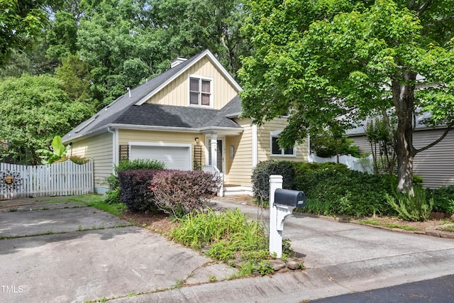 102 Legacy Ln, Durham, NC 27713 - view of front facade featuring a shingled roof and an attached garage