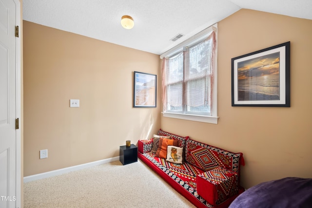 102 Legacy Ln, Durham, NC 27713 - living area featuring carpet flooring, baseboards, and vaulted ceiling