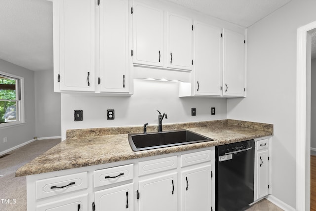 6009 Shadow Moss Cir, Raleigh, NC 27603 - kitchen featuring dishwasher, a sink, baseboards, and white cabinets