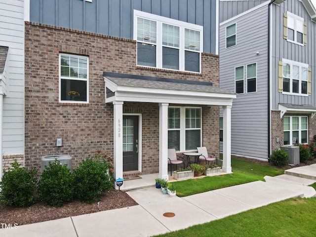 6928 Leesville Rd, Raleigh, NC 27613 - multi unit property with covered porch, board and batten siding, and brick siding