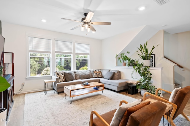 6928 Leesville Rd, Raleigh, NC 27613 - living area featuring healthy amount of natural light, light wood finished floors, a ceiling fan, and recessed lighting
