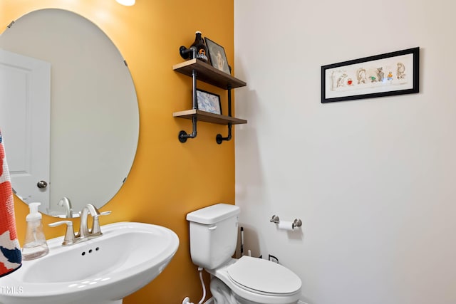 6928 Leesville Rd, Raleigh, NC 27613 - bathroom with a sink and toilet