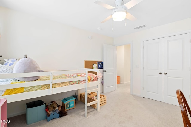 6928 Leesville Rd, Raleigh, NC 27613 - bedroom featuring light colored carpet, a closet, and ceiling fan