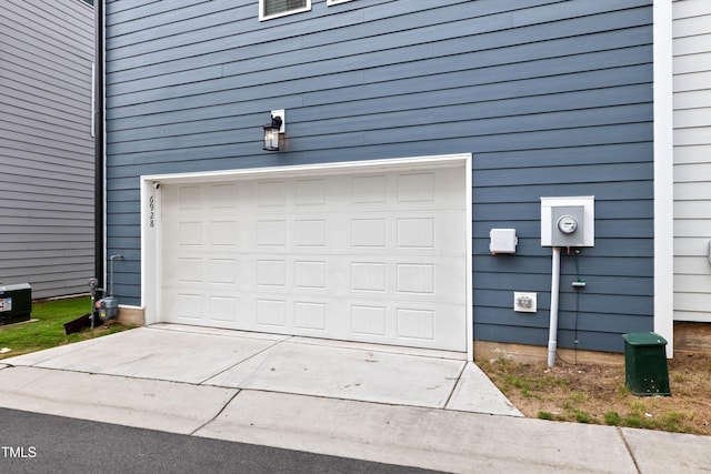 6928 Leesville Rd, Raleigh, NC 27613 - garage featuring concrete driveway