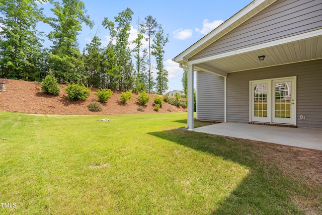 33 E Ravano Dr, Clayton, NC 27527 - view of green lawn with a patio area