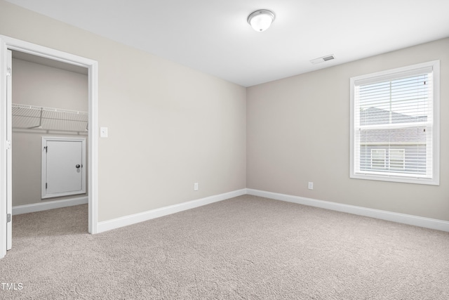 33 E Ravano Dr, Clayton, NC 27527 - empty room with light colored carpet and baseboards