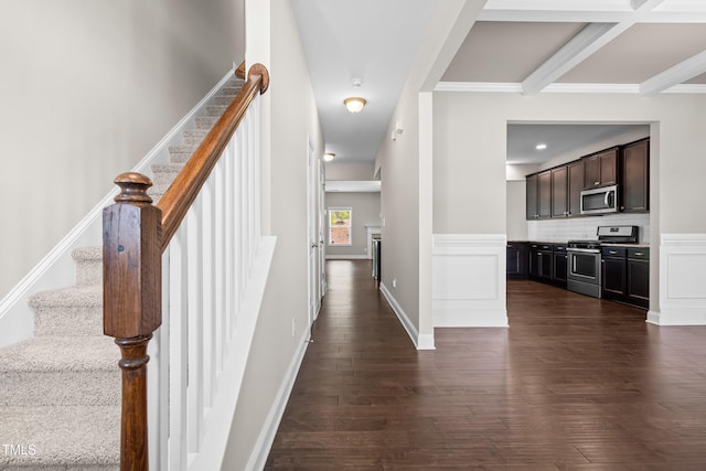 33 E Ravano Dr, Clayton, NC 27527 - hallway with stairway, dark wood-style flooring, beam ceiling, and ornamental molding