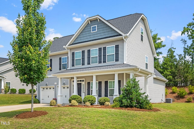 33 E Ravano Dr, Clayton, NC 27527 - view of front facade with covered porch, an attached garage, driveway, a front lawn, and central air condition unit