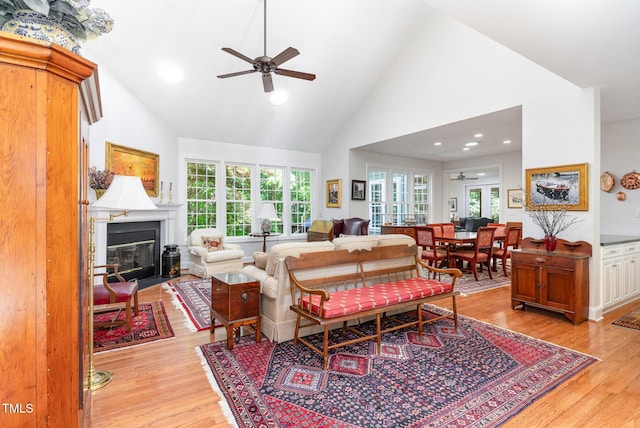 850 N Langdon, Pittsboro, NC 27312 - living area featuring ceiling fan, high vaulted ceiling, light wood finished floors, a fireplace with flush hearth, and recessed lighting