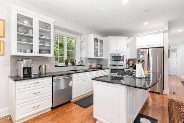 850 N Langdon, Pittsboro, NC 27312 - kitchen featuring appliances with stainless steel finishes, a sink, white cabinetry, a center island, and recessed lighting