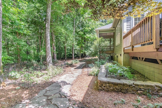 850 N Langdon, Pittsboro, NC 27312 - view of yard with a sunroom and a wooden deck