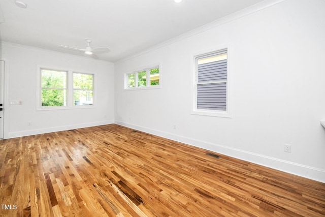 1621 Ella Wiggins Way, Raleigh, NC 27603 - empty room featuring ornamental molding, light wood-type flooring, baseboards, and ceiling fan