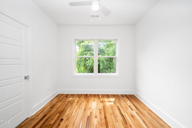 1621 Ella Wiggins Way, Raleigh, NC 27603 - spare room featuring light wood finished floors, baseboards, and a ceiling fan