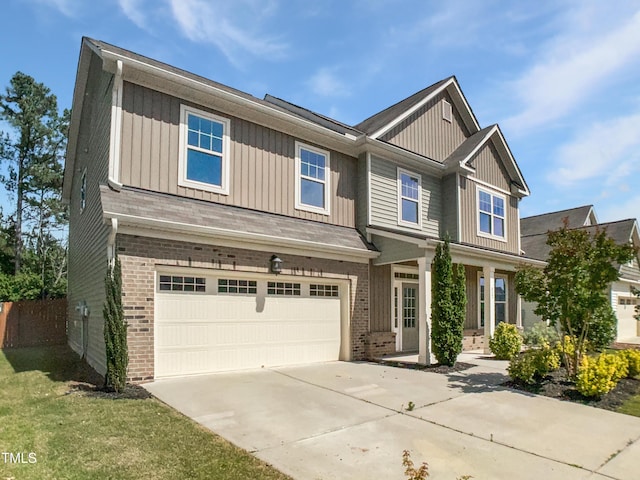617 Hiddenbrook Dr, Durham, NC 27703 - craftsman inspired home with brick siding, driveway, an attached garage, and a porch