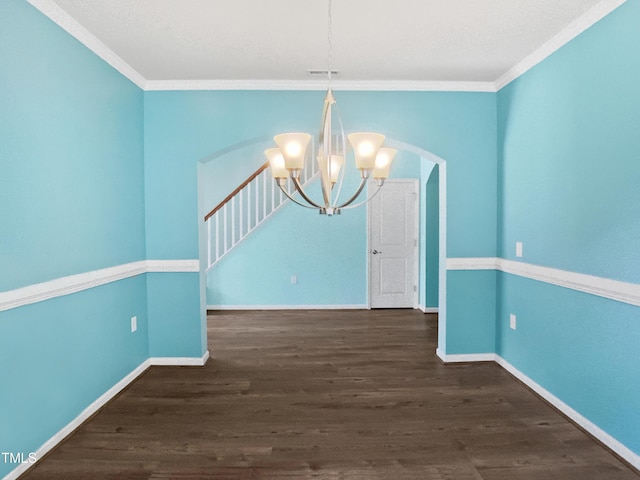 617 Hiddenbrook Dr, Durham, NC 27703 - unfurnished dining area with a chandelier, wood finished floors, ornamental molding, baseboards, and stairs
