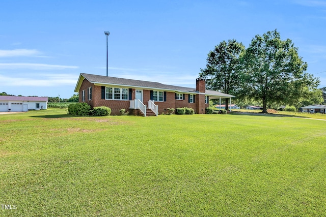 6080 US-421 N, Lillington, NC 27546 - single story home featuring brick siding, a chimney, and a front lawn