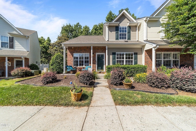 34 Tannenbaum Cir, Greensboro, NC 27410 - traditional-style house with brick siding