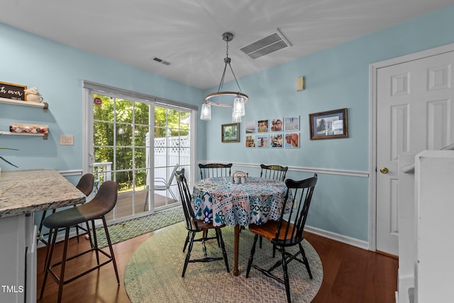 34 Tannenbaum Cir, Greensboro, NC 27410 - dining room featuring wood finished floors and baseboards