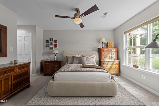34 Tannenbaum Cir, Greensboro, NC 27410 - carpeted bedroom with baseboards and ceiling fan