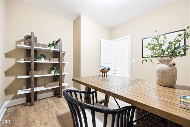 209 Broomgrove Way, Wake Forest, NC 27587 - dining space featuring light wood-style flooring and baseboards