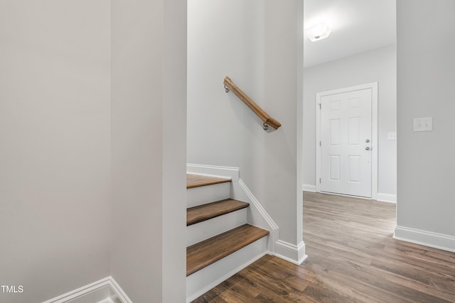 209 Broomgrove Way, Wake Forest, NC 27587 - staircase with wood finished floors and baseboards