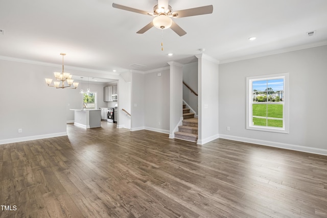 209 Broomgrove Way, Wake Forest, NC 27587 - unfurnished living room featuring dark wood finished floors, ornamental molding, baseboards, ceiling fan, and stairs