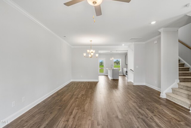 209 Broomgrove Way, Wake Forest, NC 27587 - unfurnished living room with dark wood-style floors, a chandelier, ceiling fan, stairs, and baseboards
