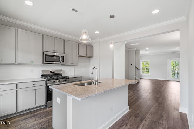 209 Broomgrove Way, Wake Forest, NC 27587 - kitchen featuring appliances with stainless steel finishes, a sink, gray cabinetry, dark wood-style flooring, and crown molding