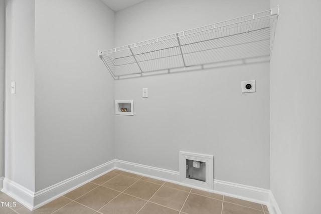 209 Broomgrove Way, Wake Forest, NC 27587 - laundry room featuring electric dryer hookup, hookup for a washing machine, baseboards, and tile patterned floors