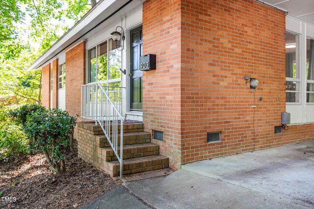 903 W Maynard Ave, Durham, NC 27704 - entrance to property with crawl space and brick siding