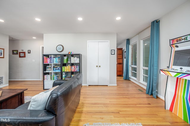 903 W Maynard Ave, Durham, NC 27704 - living area featuring light wood-style floors, baseboards, and recessed lighting