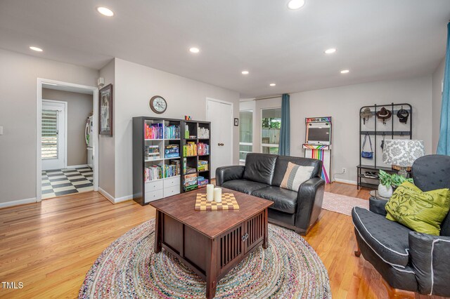 903 W Maynard Ave, Durham, NC 27704 - living room with recessed lighting, light wood finished floors, and baseboards