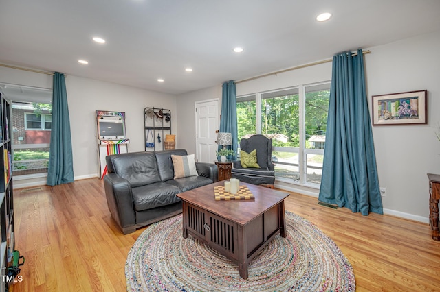 903 W Maynard Ave, Durham, NC 27704 - living room with recessed lighting, light wood-style floors, healthy amount of natural light, and baseboards