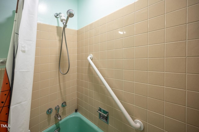 903 W Maynard Ave, Durham, NC 27704 - bathroom featuring shower / bath combination with curtain