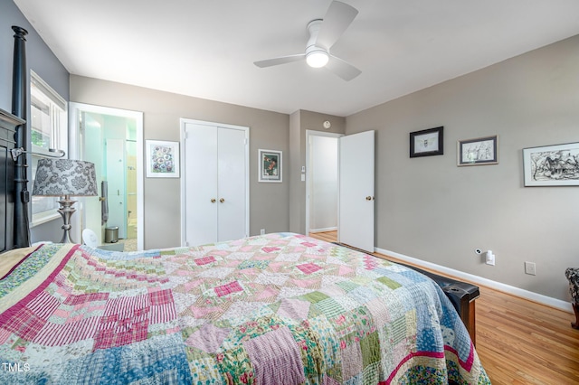 903 W Maynard Ave, Durham, NC 27704 - bedroom with baseboards, wood finished floors, a ceiling fan, a closet, and connected bathroom