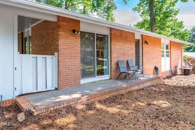 903 W Maynard Ave, Durham, NC 27704 - back of property with brick siding and central air condition unit
