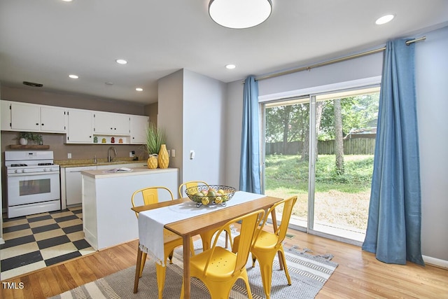 903 W Maynard Ave, Durham, NC 27704 - dining area featuring recessed lighting and light wood finished floors