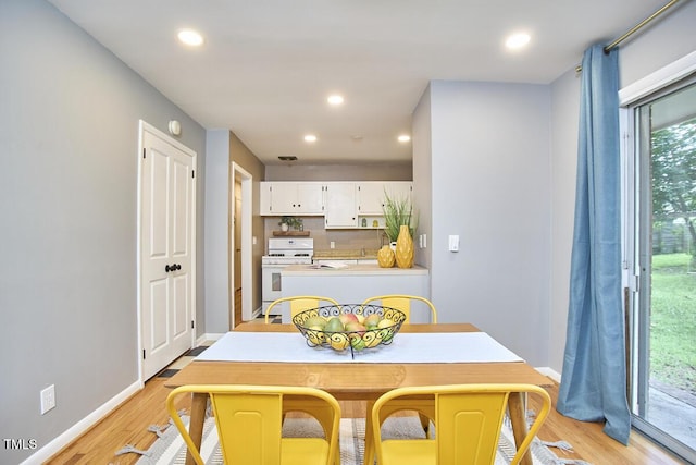 903 W Maynard Ave, Durham, NC 27704 - dining area featuring light wood-style floors and recessed lighting